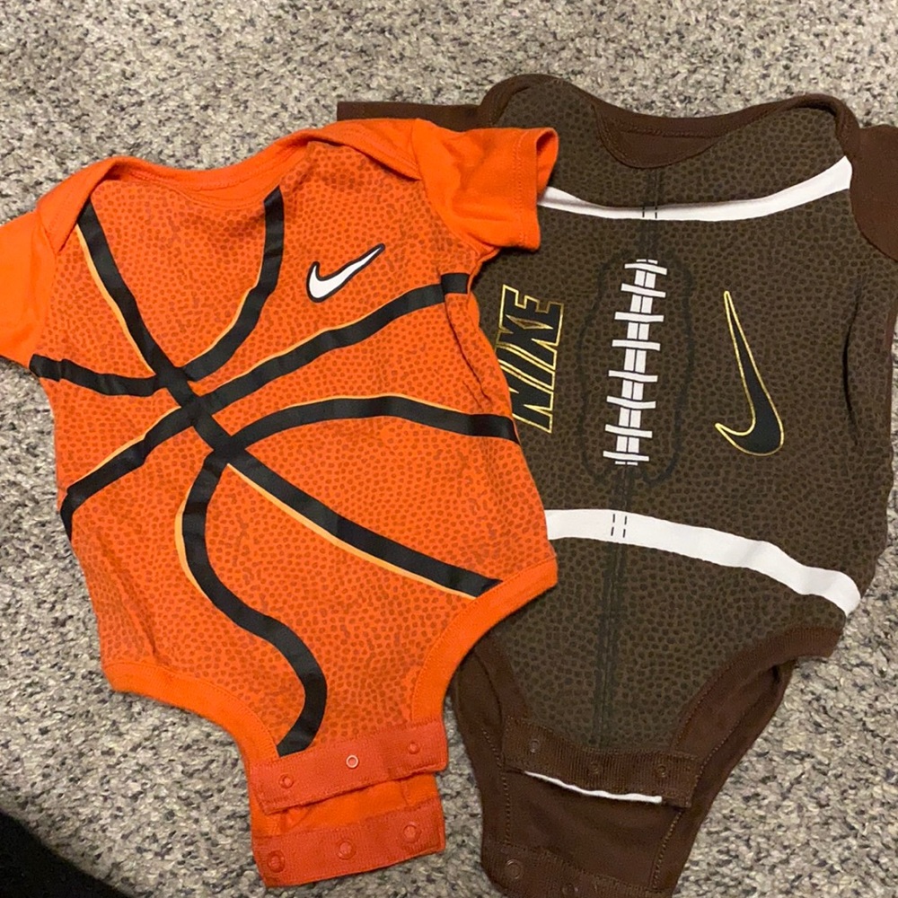 2 Nike 3-6 months onesies